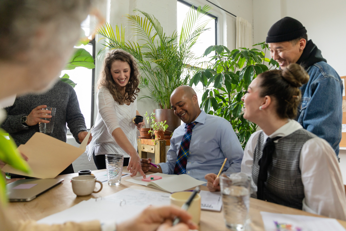 collagues-engaging-collaborating-in-office-happy